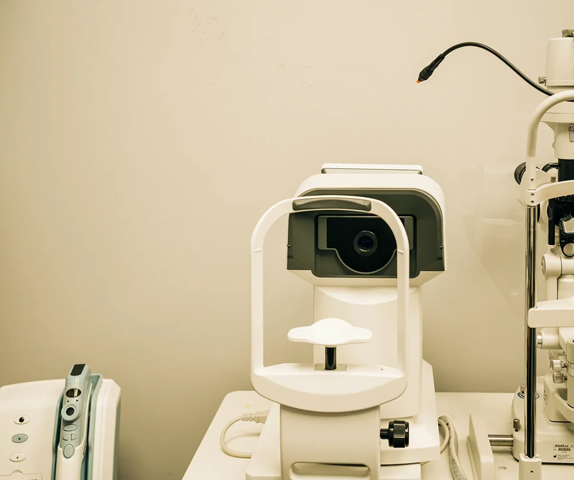 Advanced eye care and optometry clinic equipment used for retinal imaging and vision diagnostics in a modern ophthalmology setup